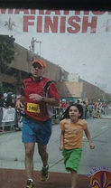 Marathon race with daughter at the finsh line